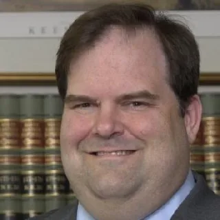 John Maurice Holcomb - Attorney