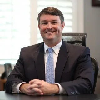Bryan E. Comer - Attorney