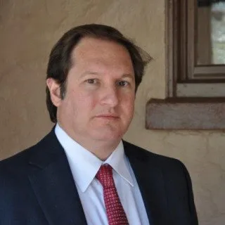 Christ Nicholas Coumanis - Attorney