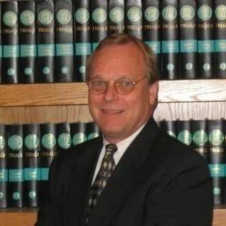 James E. Riha - Attorney