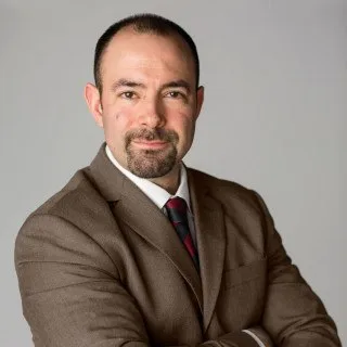 Mario F. Riquelme - Attorney