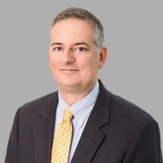 Russell M. Racine - Attorney