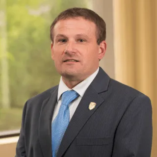 Greg T. Rinckey - Attorney