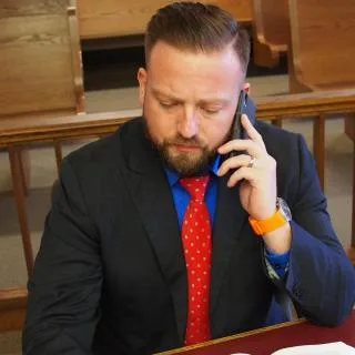 Earl J. Garrett - Attorney