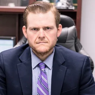 Lawrence Edward Tickle Jr. - Attorney