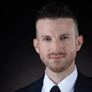 Evan Thomas Wozniak - Attorney