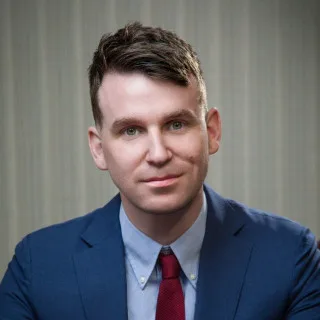 Travis Shimanek - Attorney